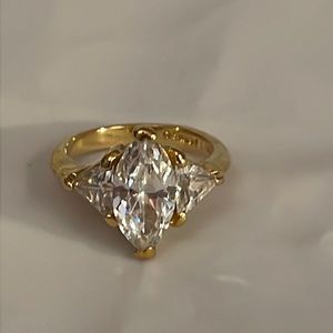 Women’s size 4 signed George Lind 14k HGE and rhinestone marquis engagement ring